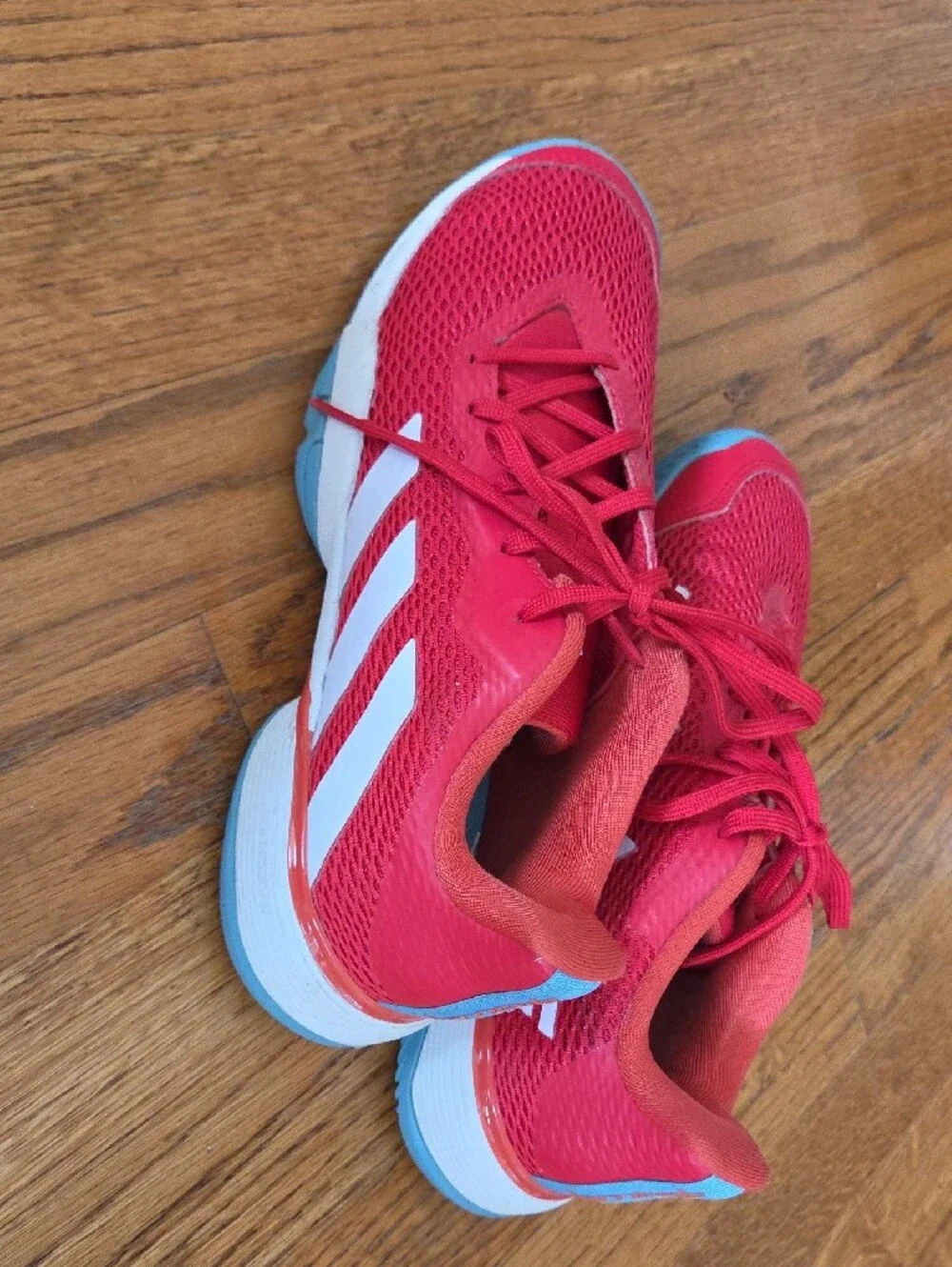 Red ADIDAS Tennis Shoes with Blue Soles